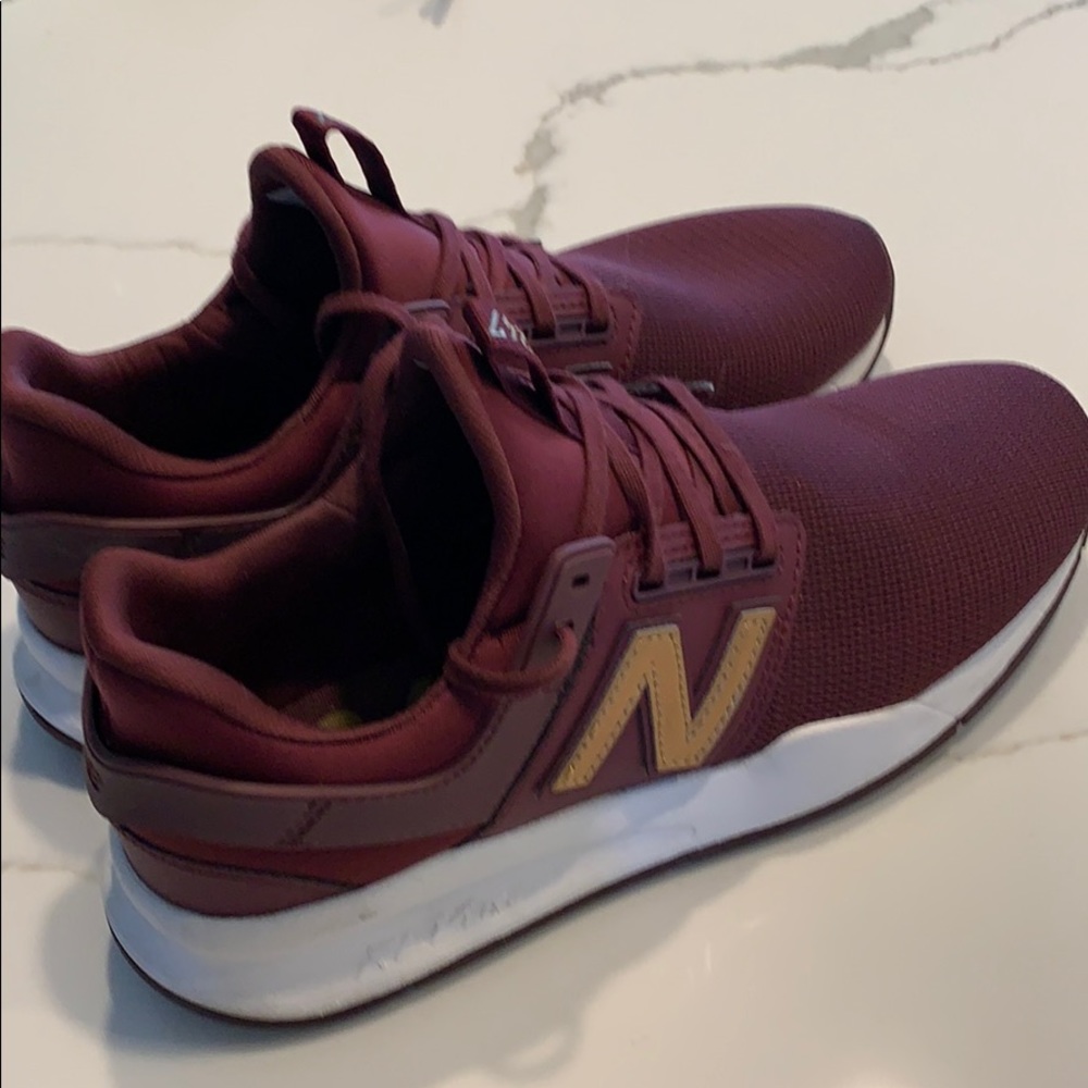 New Balance burgundy and bronze 247 sneakers. Great used condition, as pictured.